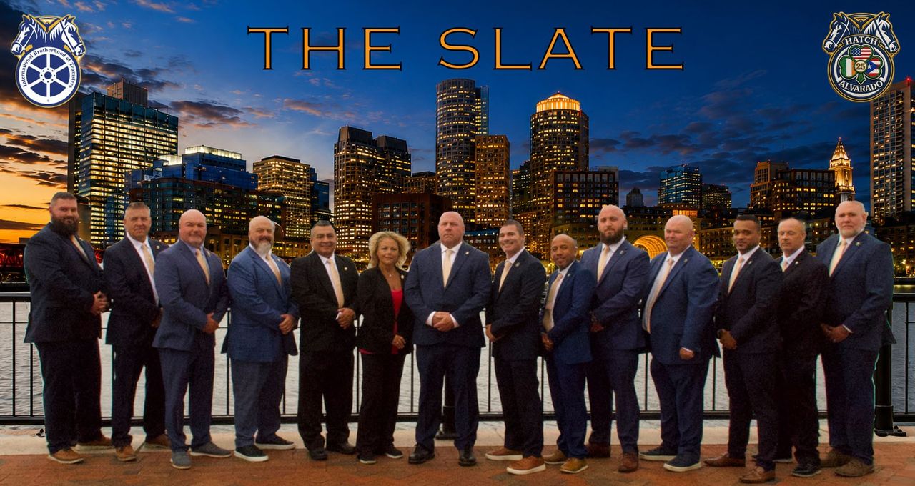 The Hatch-Alvarado 2028 slate for Teamsters Local 25 — the full team of officers, Business Agents, and Trustees on the East Boston waterfront with the Boston skyline
